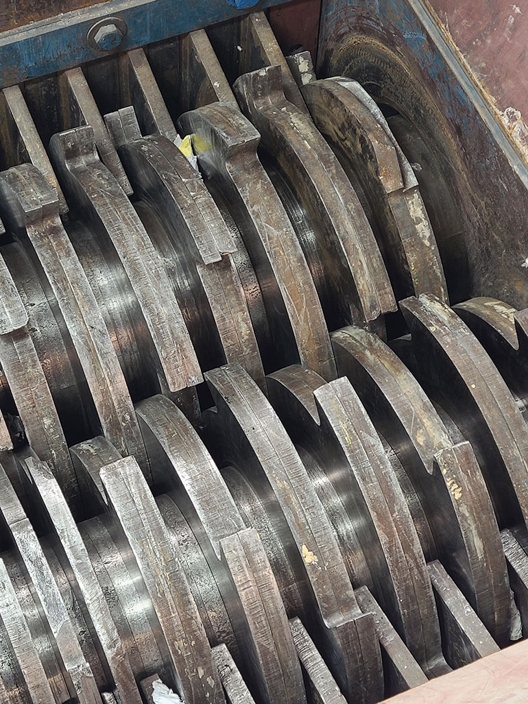 A grinder for fiberglass electrical conduit pipe and conduit hanger parts