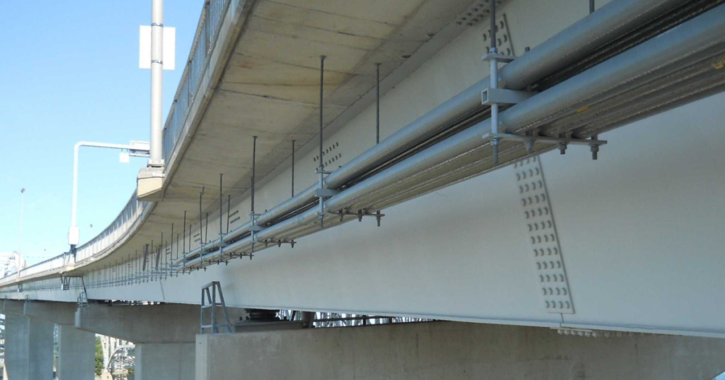 Conduit runs along a bridge in Canada.