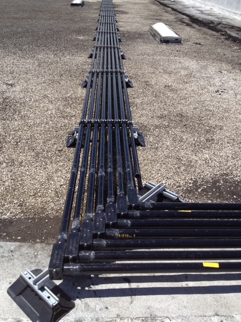 Conduit installed upon a rooftop.