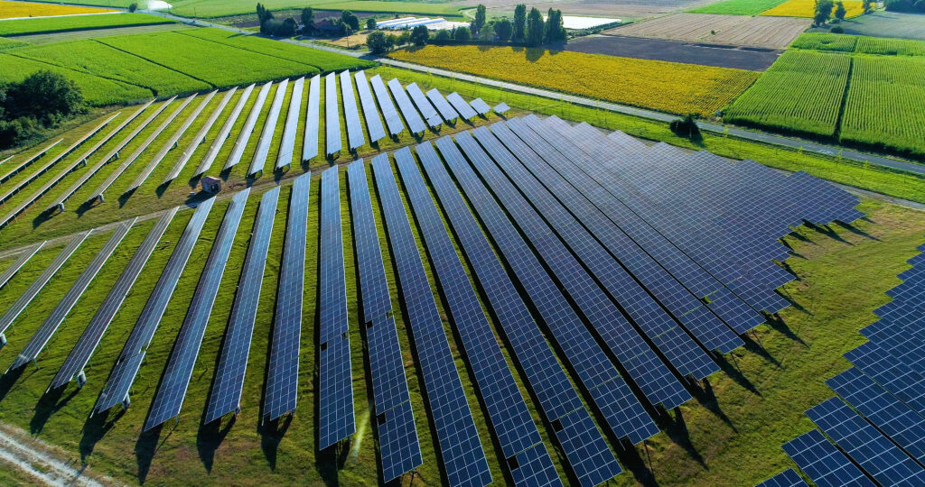 A solar farm in a green field
